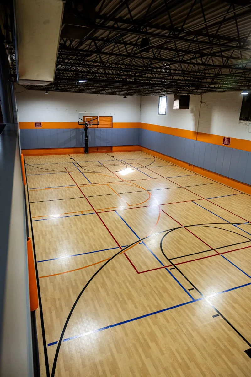 Indoor basketball court inside the Impact Zone NJ facility in Norwood, New Jersey